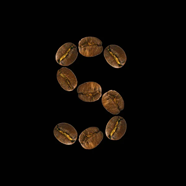 Coffee font alphabet concept isolated on white background. Top view Alphabet made of roasted coffee beans. Letter S