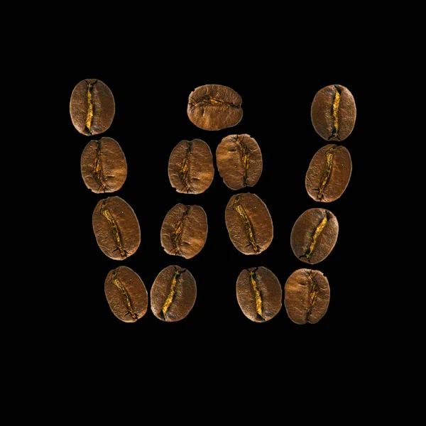 Conceito alfabeto fonte de café isolado no fundo branco. Top view Alfabeto feito de grãos de café torrados. Carta W — Fotografia de Stock