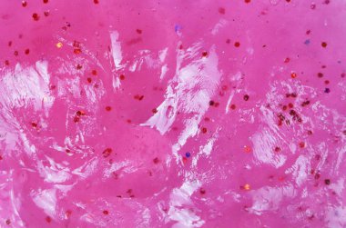 Pembe arka plan: sparkles içinde yapışkan doku. Jöle lateks