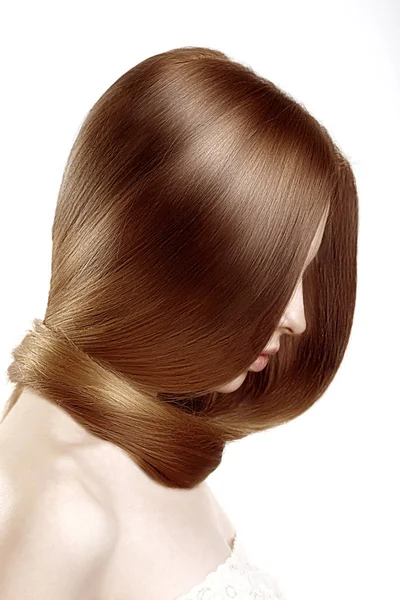 健康的な光沢のある長い髪の美しいモデル 美容ヘアケア サロンでスタイリストによる豪華な髪型 ロイヤリティフリーのストック画像