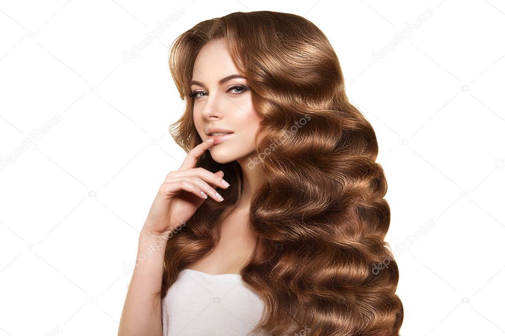 Long hair. Waves Curls Hairstyle. Hair Salon. Updo. Fashion model with shiny hair. Woman with healthy hair girl with luxurious haircut. Hair loss Girl with hair volume. 