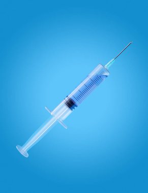 Mavi backgroun izole enjeksiyon için ilaç ile şırınga