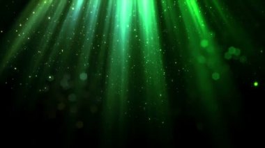 Sorunsuz düşen parçacıklar ve yumuşak büyülü üst ışık akışından bokeh. Aydınlık ve parlak parçacık siyah bir arka plan üzerinde yavaş yavaş izole karanlıkta geçiyoruz. İlmekledi