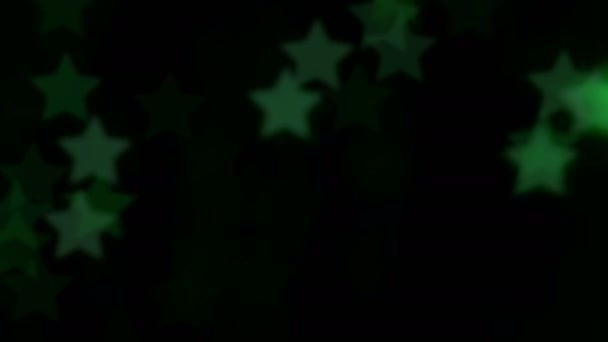 Lumières bokeh sous la forme d'étoiles et flou. Fond lumineux pour la vidéo ou les présentations. Les étoiles brillantes clignotent et créent une atmosphère festive et remplissent parfaitement l'espace avec leur dynamique de lumière et de couleur 