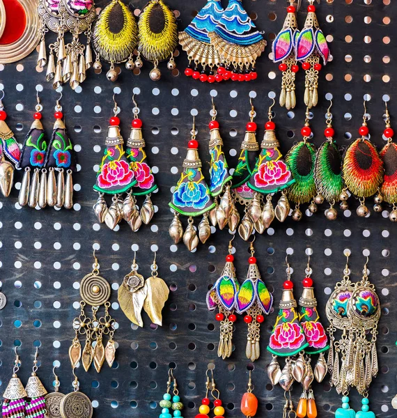 Colorful decoration for sale. Earrings handmade, Luang Prabang, Laos. Close-up