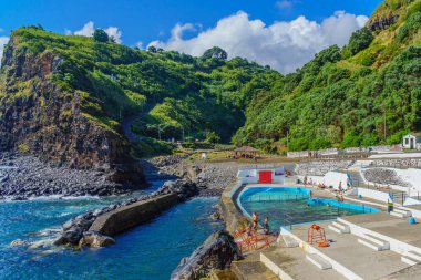 Nordeste, Portugal September 4. 2020: Piscina Natural Da Boca De Ribeira, Nordeste, Sao Miguel Atlantic Ocean. Natural pool at the sea, Portugal.