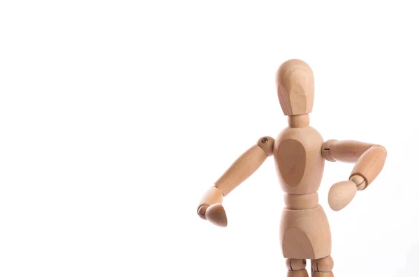 木制人形人体模特在行动中的姿势与白色背景隔离 — 图库照片