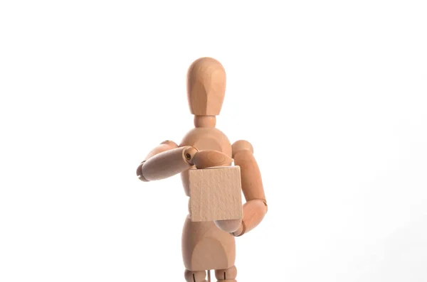 木制人形人体模特在行动中的姿势与白色背景隔离 — 图库照片