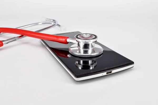 stethoscope on smartphone - checking security on smartphone concept.Selective focus.