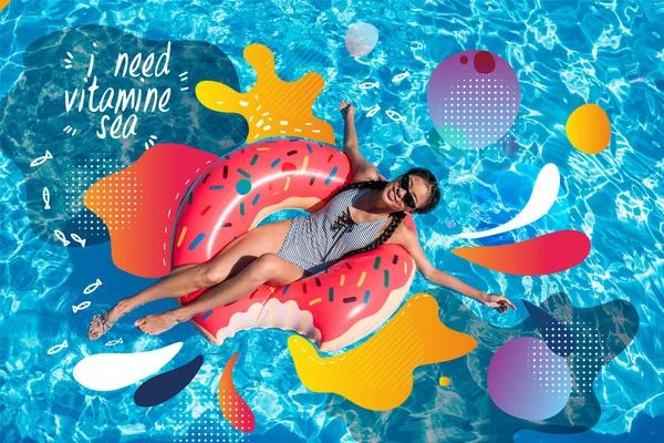 Asian woman on inflatable donut in pool — Stock Photo, Image