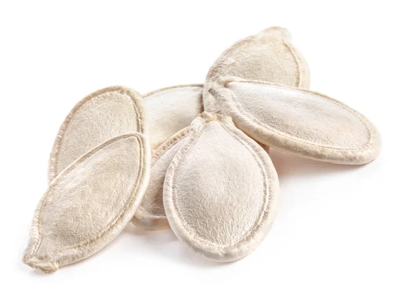 Beyaz arkaplanda izole edilmiş kabak tohumları — Stok fotoğraf