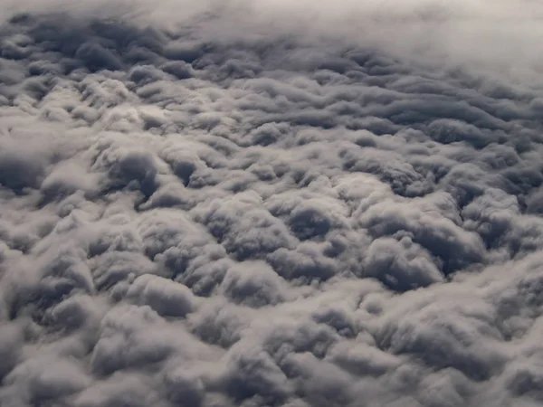 Clouds from plane window looks like a cotton bed — Stock Photo, Image