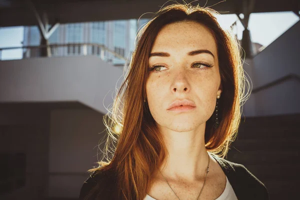 An image of a modern red-haired girl with freckles. Closeup portrait looking at camera — Stock Photo, Image