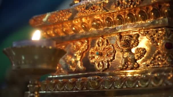 Candle on the background of a Buddhist altar with an ornament. Central Khurul cities Elista, Kalmykia — Stock Video