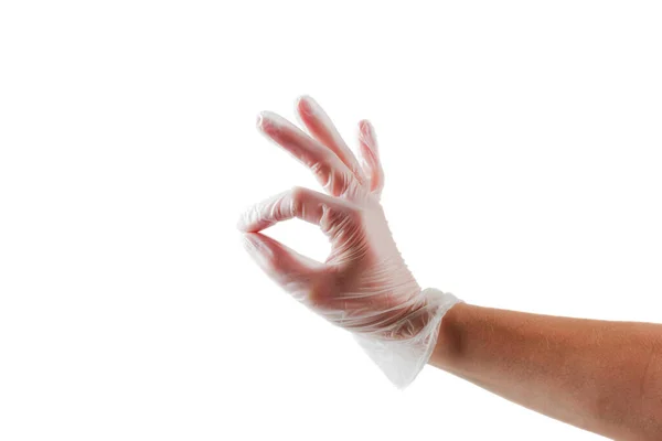 白い背景に隔離されたビニール手袋で手 ロイヤリティフリーのストック写真