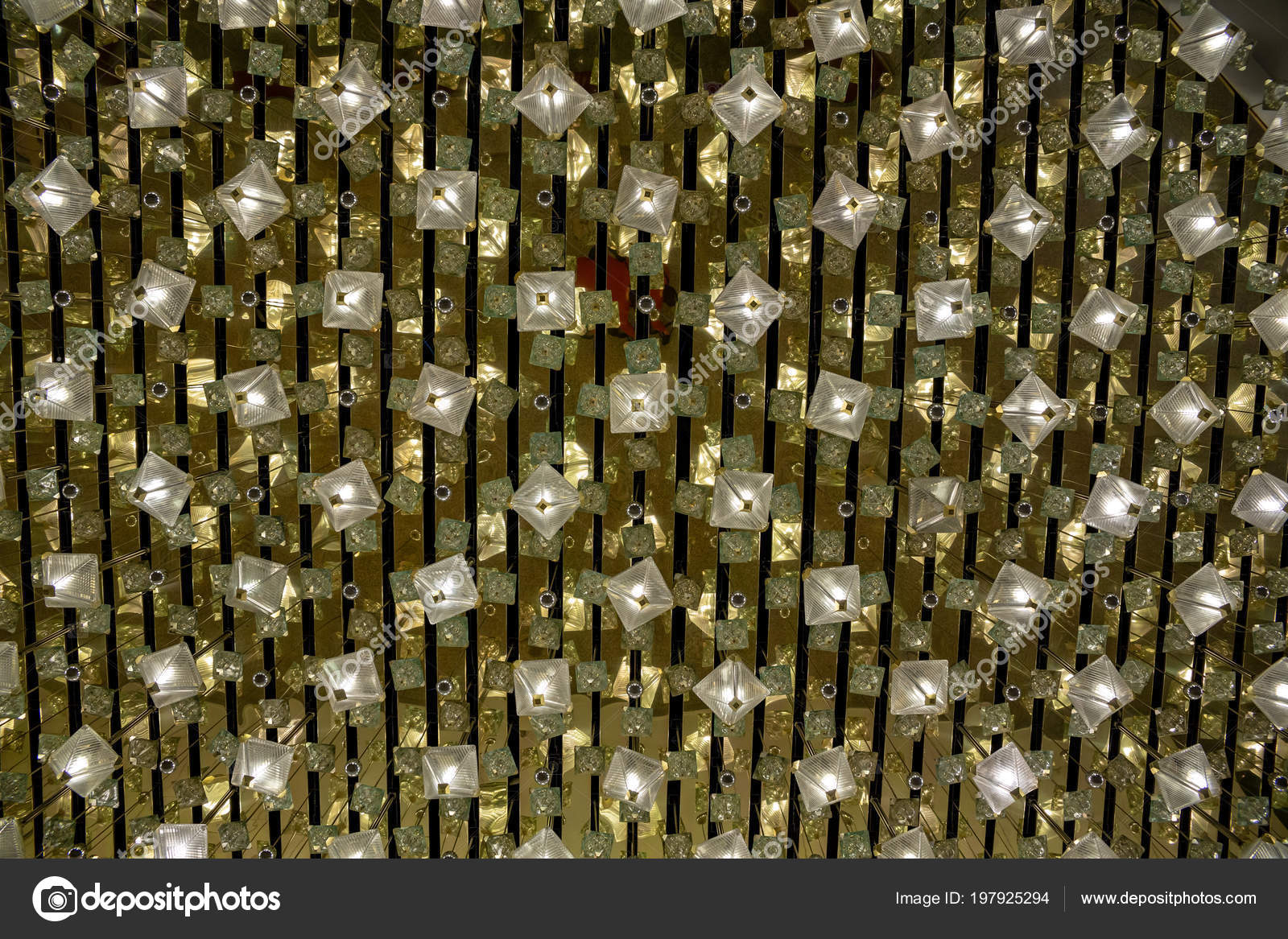 Many Pendant Lights On A Thin And Short Base Stock Photo