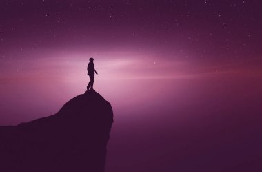 Bir dağın tepesindeki adam