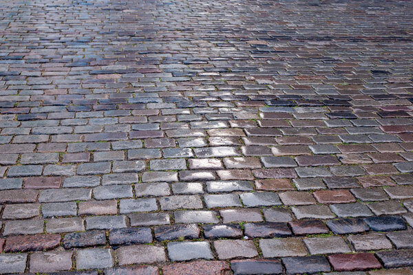 Old pavers and paved cobblestone pavement, historical value