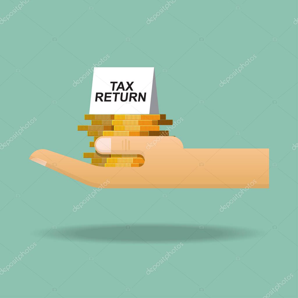 Tax return concept,coin and tax return sign on hand.
