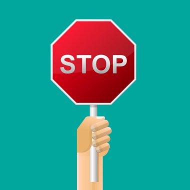 Trafik işaretini tutan bir el..