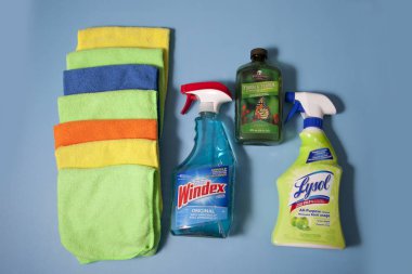 Lysol, Windex and Melaleuca with cleaning cloths clipart