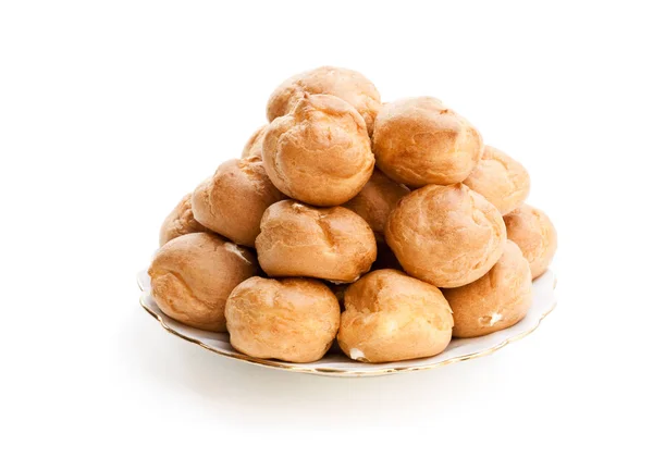 Profiteroles Caseros Aislados Blanco —  Fotos de Stock