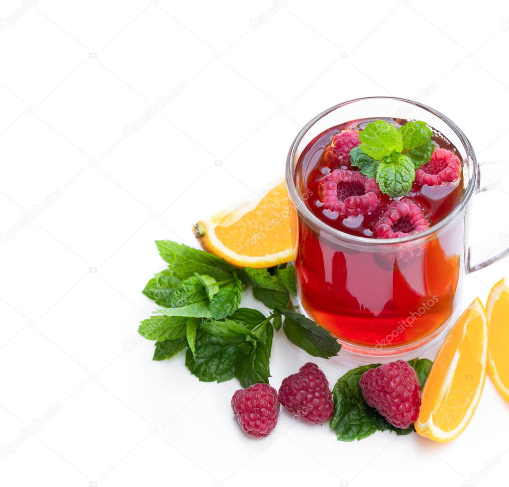Red fruit  tea with raspberry and orange isolated on white background 