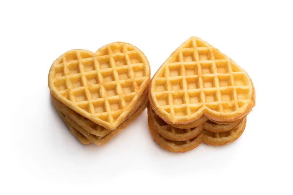 Stacks of heart shaped waffles isolated on white — Stock Photo, Image