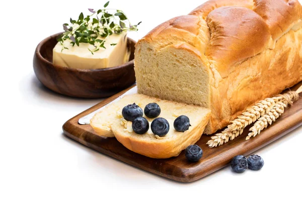 Homemade brioche loaf with butter and blueberry isolated on white — Stock Photo, Image
