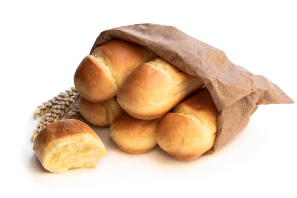 Mini brioche bun in paper bag isolated on white — Stock Photo, Image