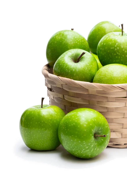Ripe green apples in wicker basket isolated on white — Stock Photo, Image