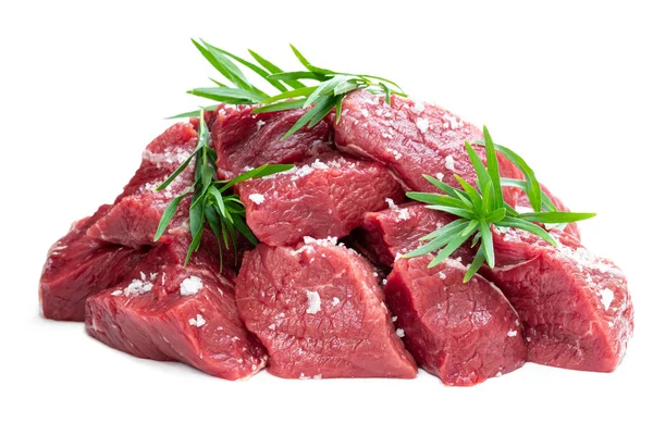 Sliced raw beef with tarragon herb isolated on white — Stock Photo, Image