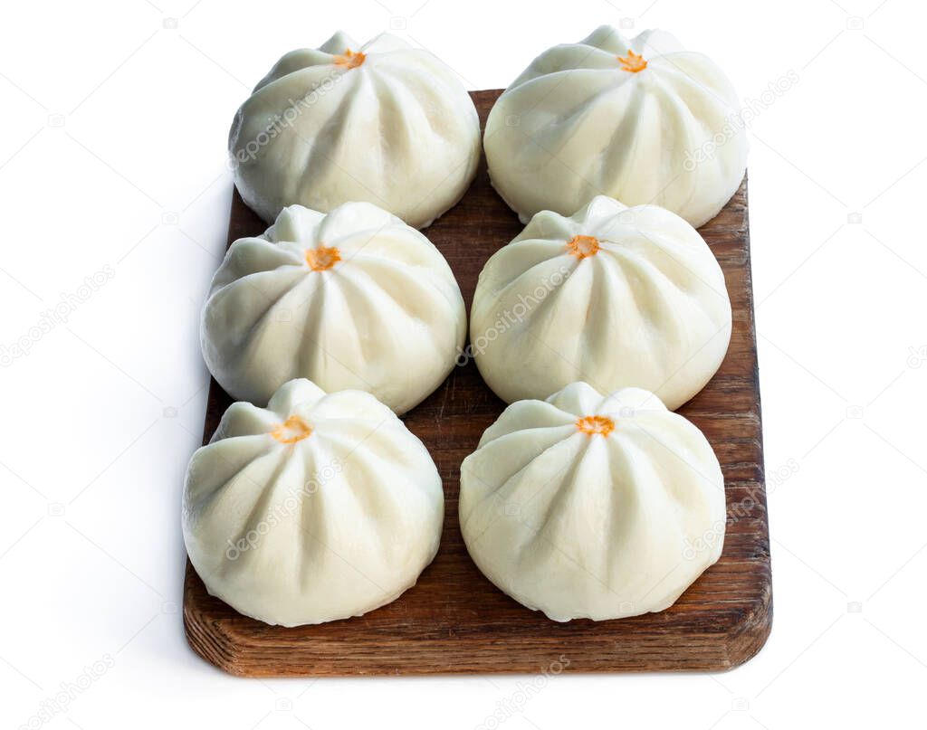 Steamed  bao buns with delicious filling isolated on white 