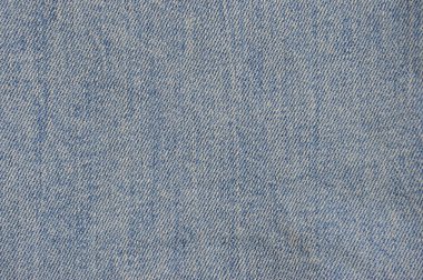 Hafif bir iplik ile mavi kot doku. Doku ekler ile gerilmiş kot