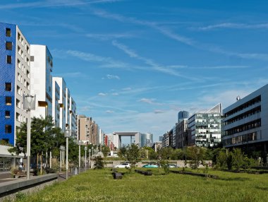 Modern housing in Nanterre with La Defense in the background, Paris, France clipart