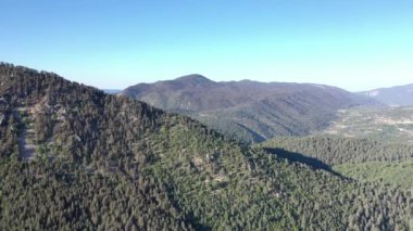 Aerial Mountain View near Kyrenia Cyprus Beautiful green mountains with green trees and clear blue sky