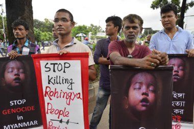 Bangladeshi Peoples' Solidarity Movement party's activist stage demonstration in front of Dhaka's United Nation Office demanding stop Genocide on Rohingya in Myanmar at Agargaon in Dhaka, Bangladesh, on September 19, 2017     clipart