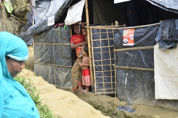 Rohingya peoples stands in the house at the Unchiprang makeshift Camp in Cox's Bazar, Bangladesh, on September 07, 2017. According to the United Nations High Commissioner for Refugees (UNHCR) more than 525,000 Rohingya refugees have fled from Myanmar