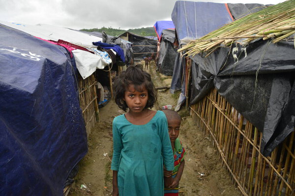 Rohingya children pose at the Unchiprang makeshift Camp in Cox's Bazar, Bangladesh, on September 07, 2017. According to the United Nations High Commissioner for Refugees (UNHCR) more than 525,000 Rohingya refugees have fled from Myanmar for violence 