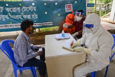 Residents talk with health worker before to get tested for the COVID-19 coronavirus at Mugda Medical College and Hospital, as the coronavirus outbreak continues, in Dhaka, Bangladesh, on June 23, 2020 clipart