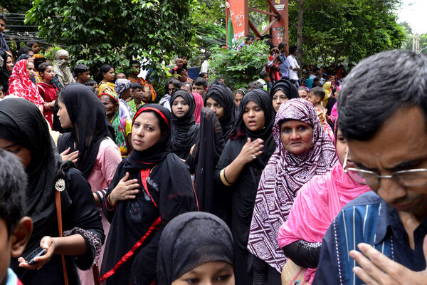 Bangladeshi Shiite Muslims perform a ritual as they take part in a religious procession during the Ashura mourning period in Dhaka, Bangladesh on October 1, 2017. The religious festival of Ashura, which includes a ten-day mourning period starting on 