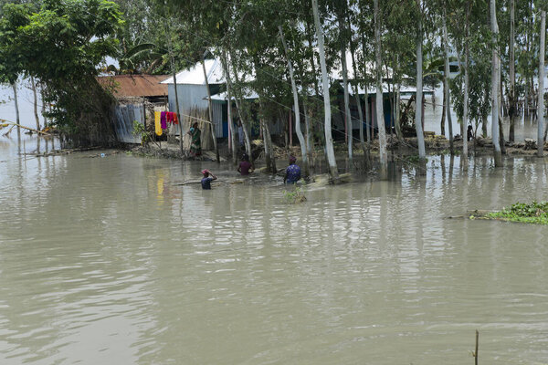 Villagers house seen surrounded by the flood water in Jamalpur District outskirts of Dhaka, Bangladesh, on August 4, 2020