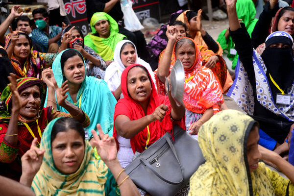 Garments workers of Dragon Group stage a demonstration in front of Department of Labor building demanding their due payment in Dhaka, Bangladesh, on September 20, 2020. 