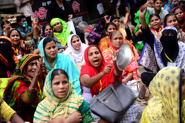 Garments workers of Dragon Group stage a demonstration in front of Department of Labor building demanding their due payment in Dhaka, Bangladesh, on September 20, 2020. 
