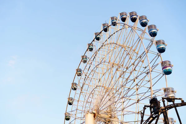 High roller Ferris wheel with blue sky as background