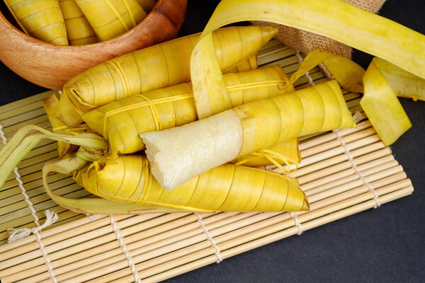 Suman sa Ibos, a traditional sticky rice cake wrapped in buli leaves