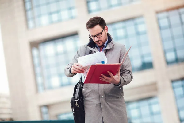 Young Attractive Businessman Holding Documents Papers Young Concentrated Man Reading — Stock Photo, Image