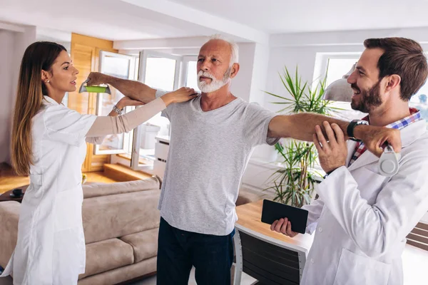 Man Having Chiropractic Arm Adjustment Physiotherapy Sport Injury Rehabilitation Senior — Stock Photo, Image