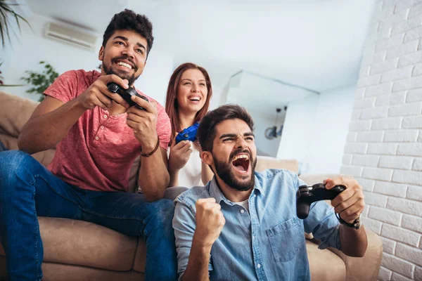 Group Young Friends Play Video Games Together Home — Stock Photo, Image