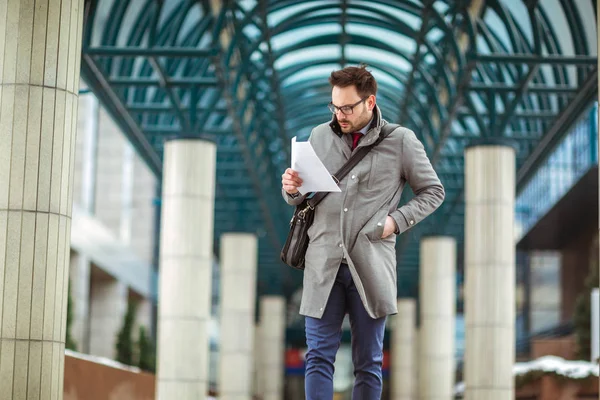 Young Attractive Businessman Holding Documents Papers Young Concentrated Man Reading — Stock Photo, Image